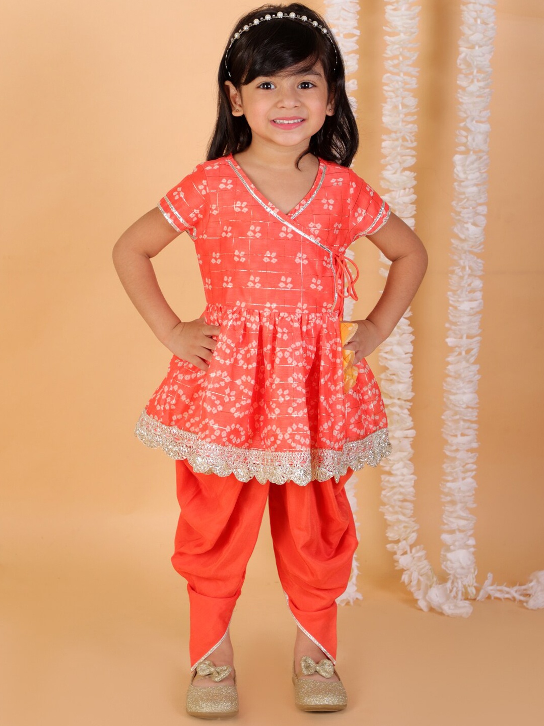 

LIL DRAMA Girls Pink Bandhani Printed Angrakha Kurti with Dhoti Pants