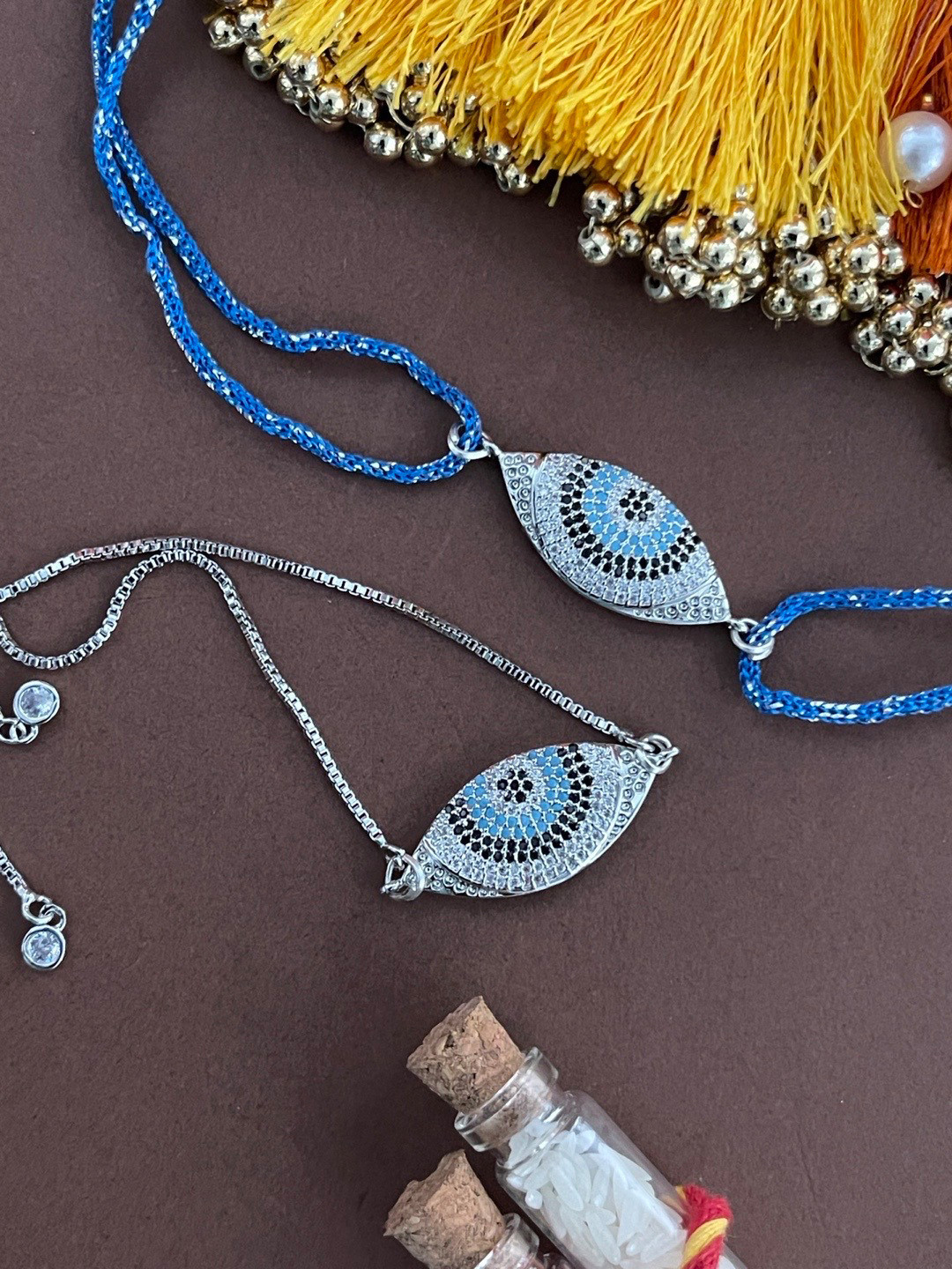 

Digital Dress Room Men Set of 2 Silver-Toned & Blue Evil-Eye Rakhi