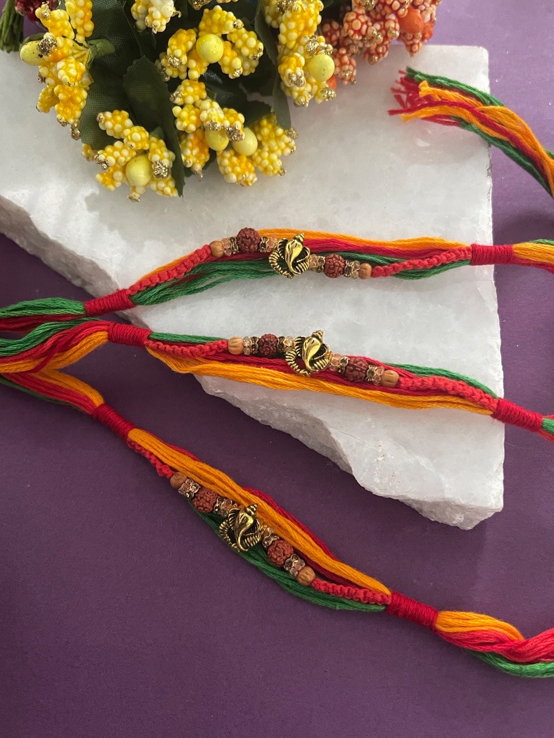 

Digital Dress Room Men Set Of 3 Gold-Toned Red & Green Ganesha Thread Rakhis