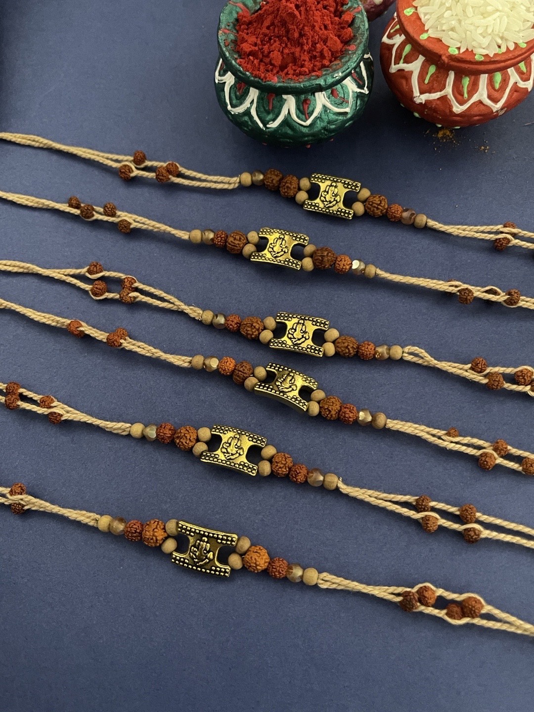 

Digital Dress Room Men Set Of 6 Gold-Colored & Brown Lord Ganesha With Rudraksha Beads Rakhi