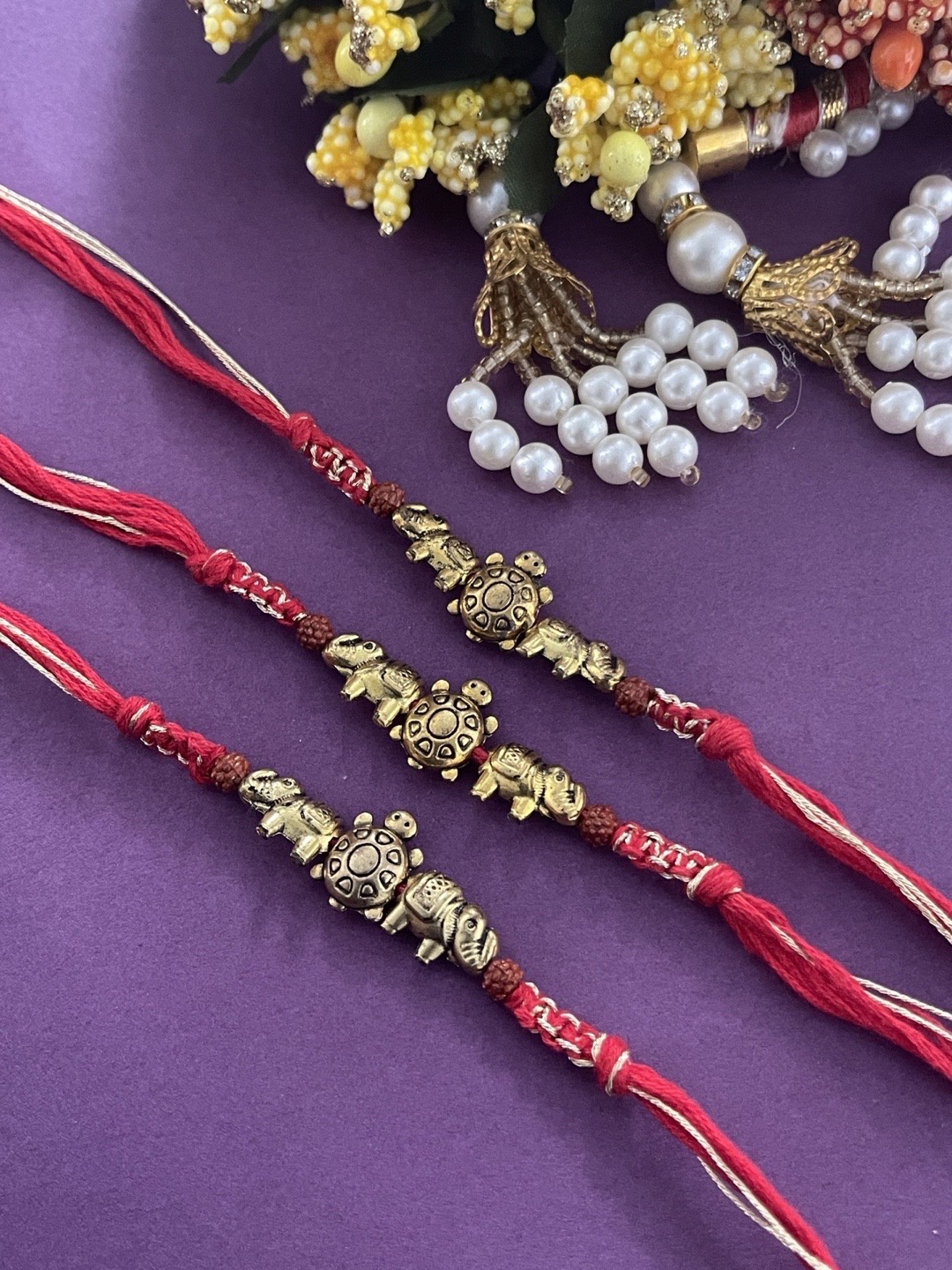 

Digital Dress Room Men Gold-Toned & Red Set Of 3 Elephant-Pendant Beaded Rakhi