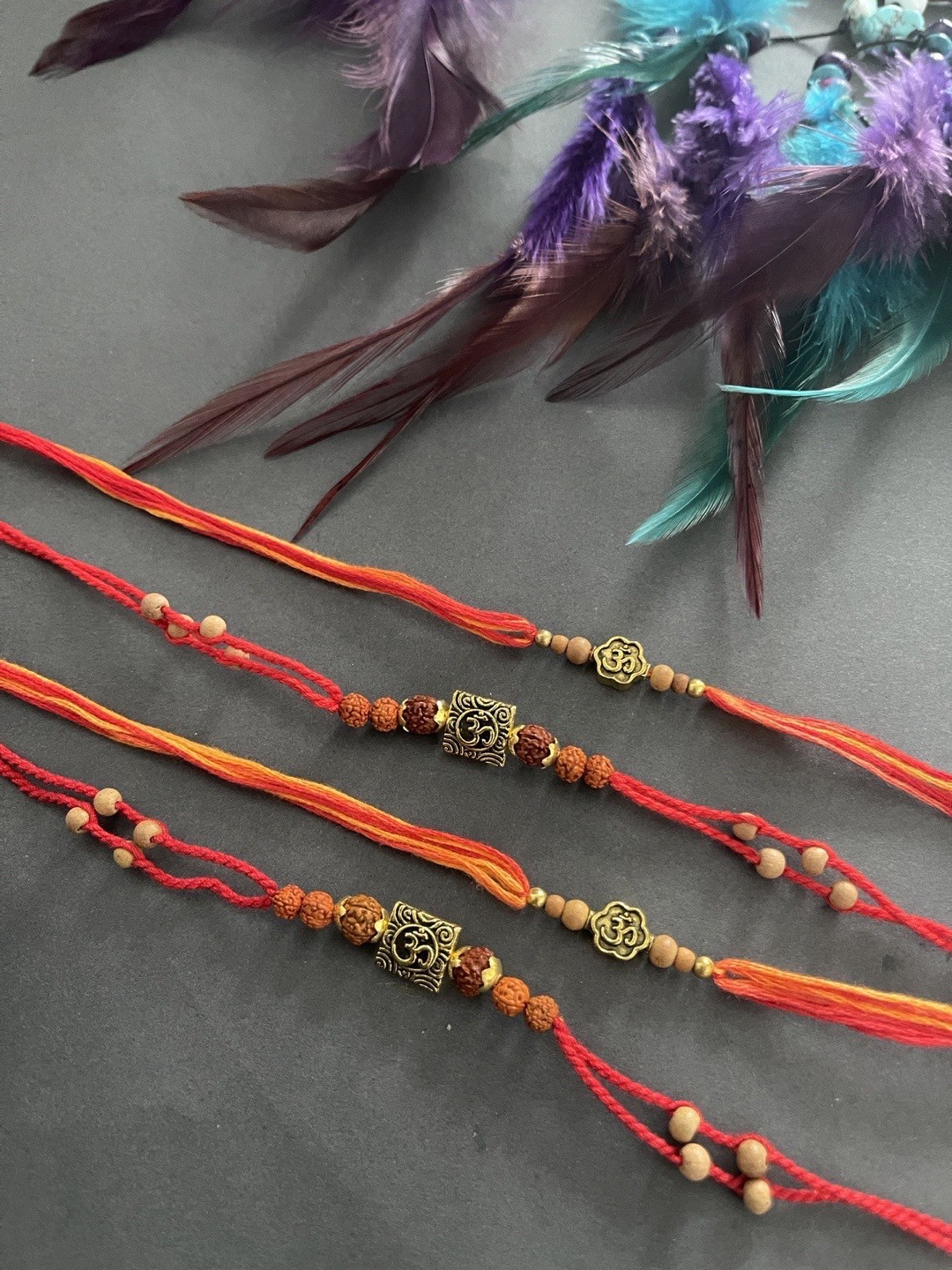 

Digital Dress Room Set Of 4 Gold-Colored & Red Rudraksha Beads Thread Rakhi