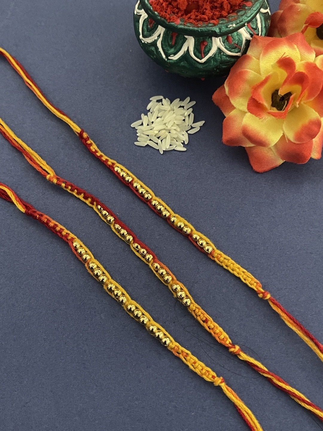 

Digital Dress Room Men Set Of 3 Gold-Colored & Red Beaded Thread Rakhi