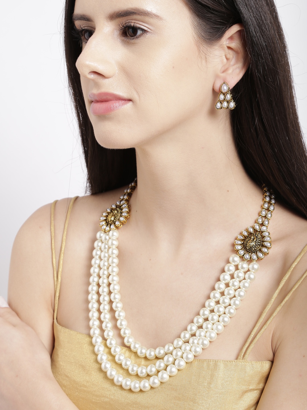 

Zaveri Pearls White & Antique Gold-Toned Beaded Jewellery Set