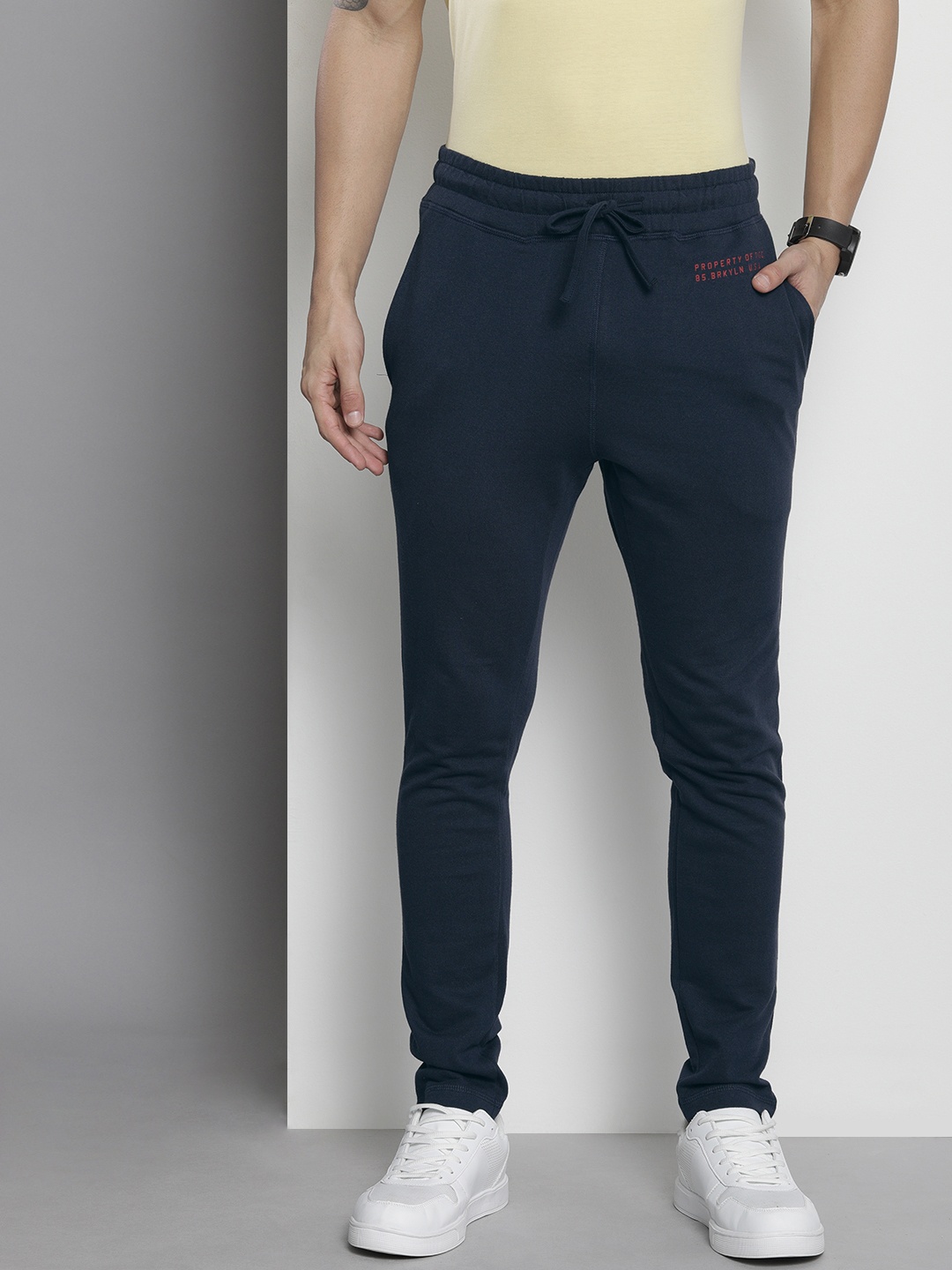 

The Indian Garage Co Men Navy Blue Typography Printed Track Pants