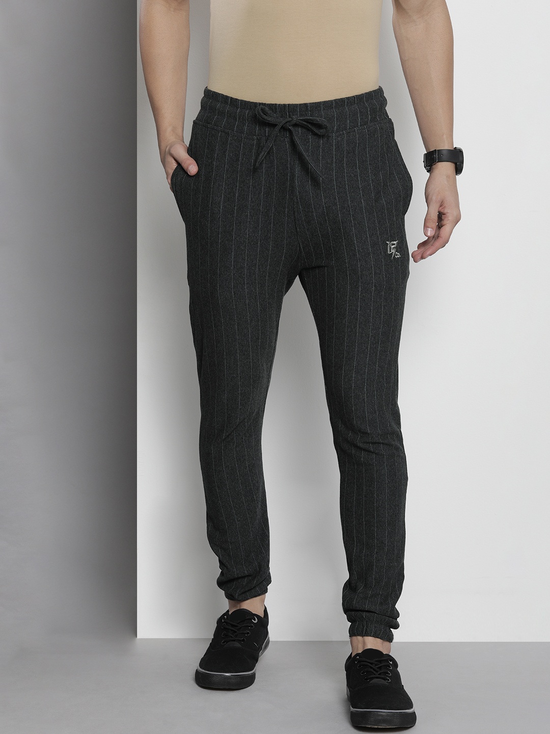 

The Indian Garage Co Men Charcoal Grey Striped Melange Effect Joggers