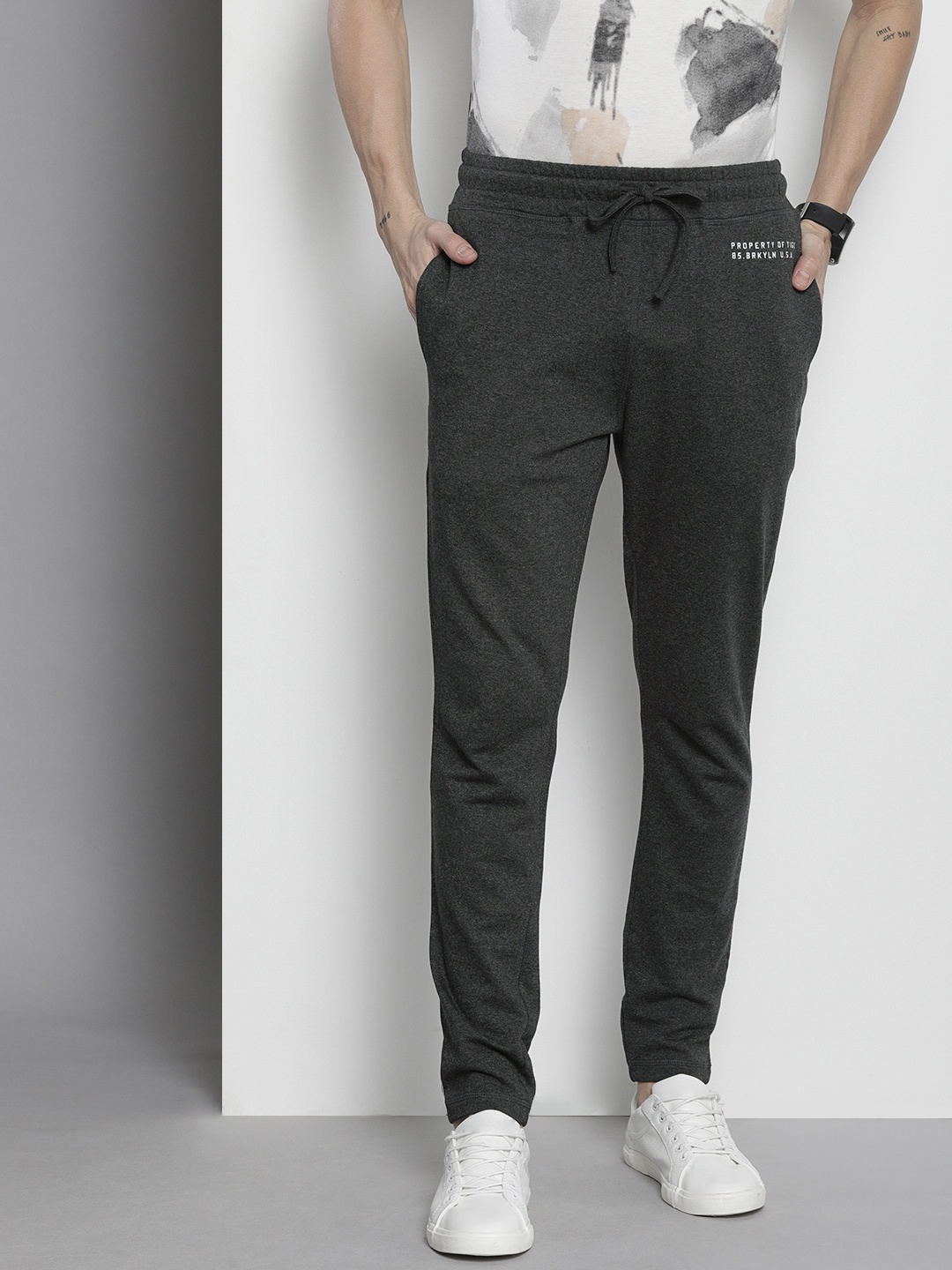 

The Indian Garage Co Men Charcoal Grey Typography Printed Melange Effect Track Pants