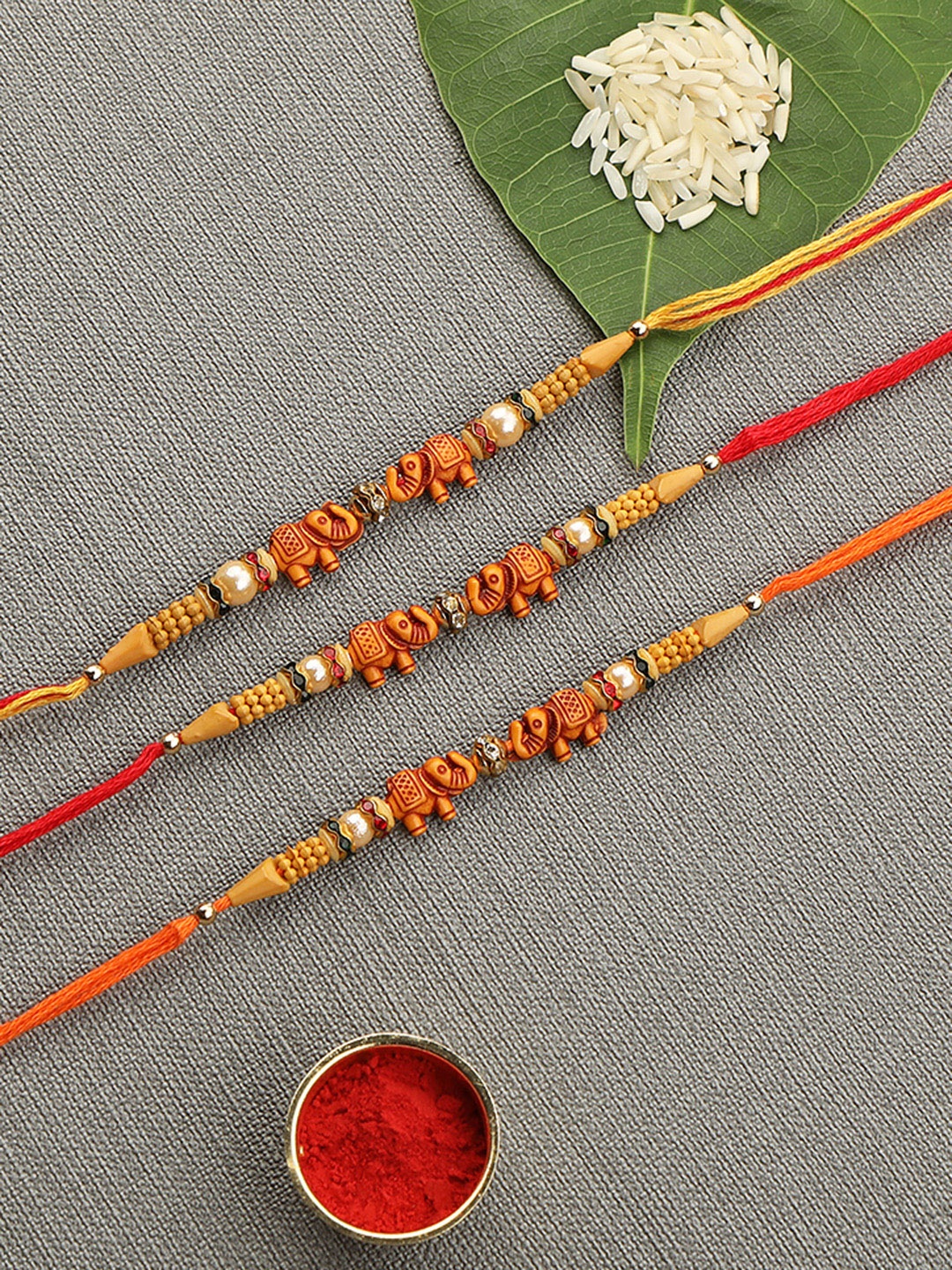 

AccessHer Set of 3 Blue Delicate Elephant Design Beads Rakhi