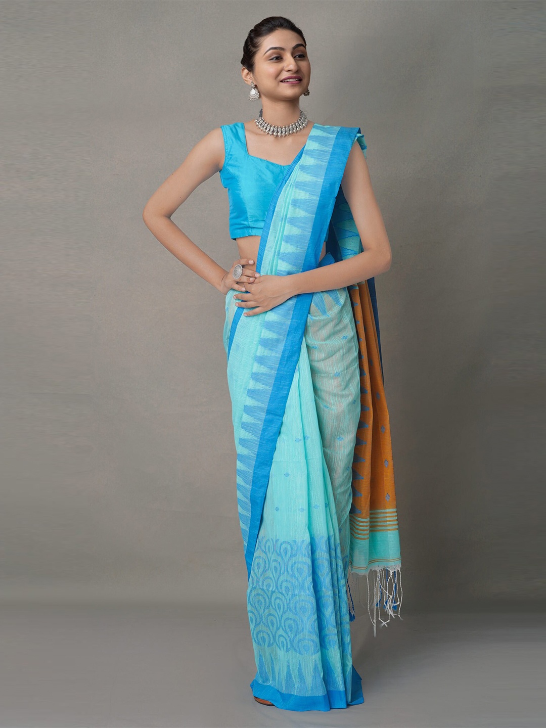 

Unnati Silks Blue Ethnic Motifs Pure Linen Jamdani Saree