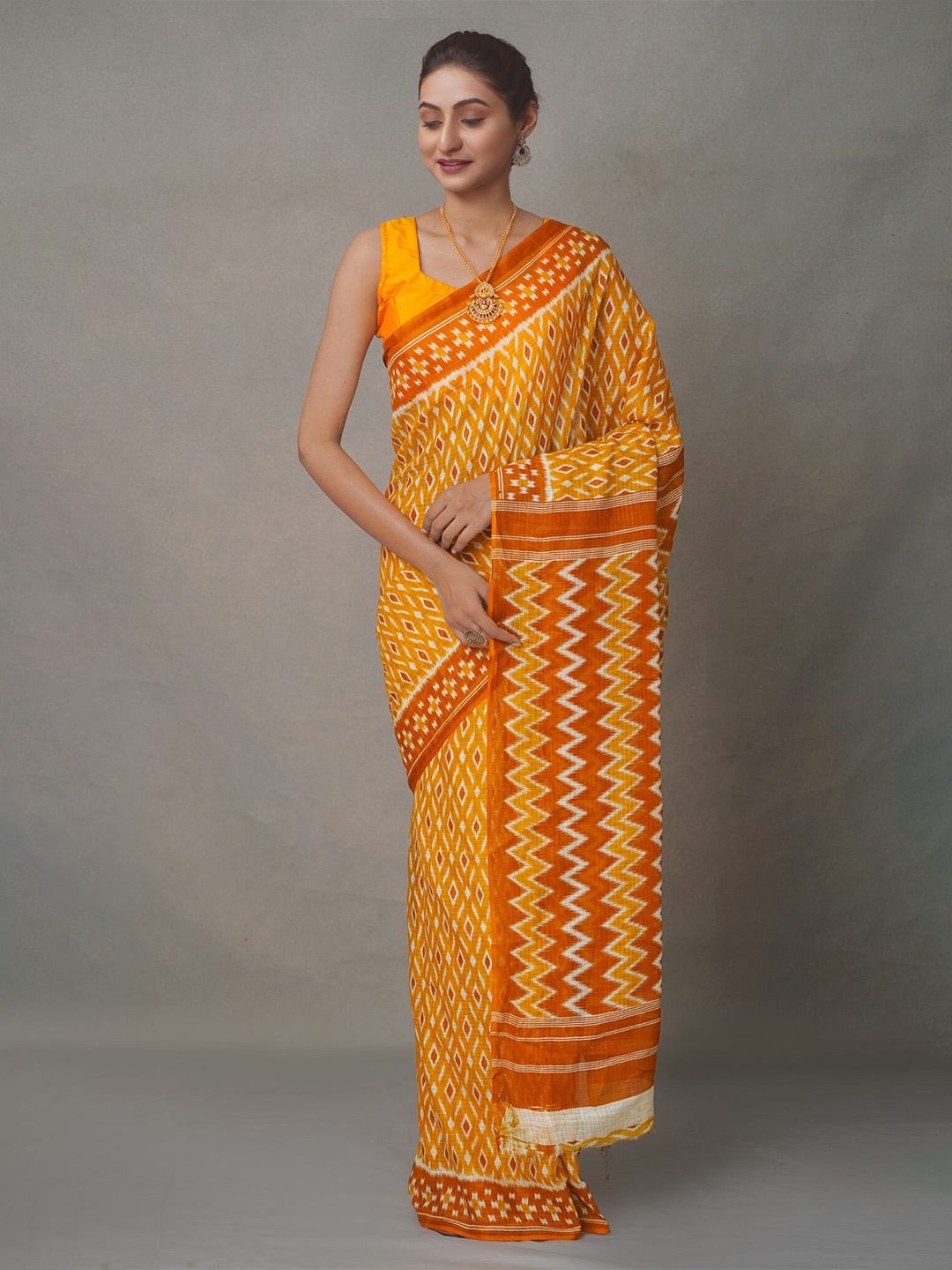 

Unnati Silks Rust & White Pure Cotton Block Print Saree
