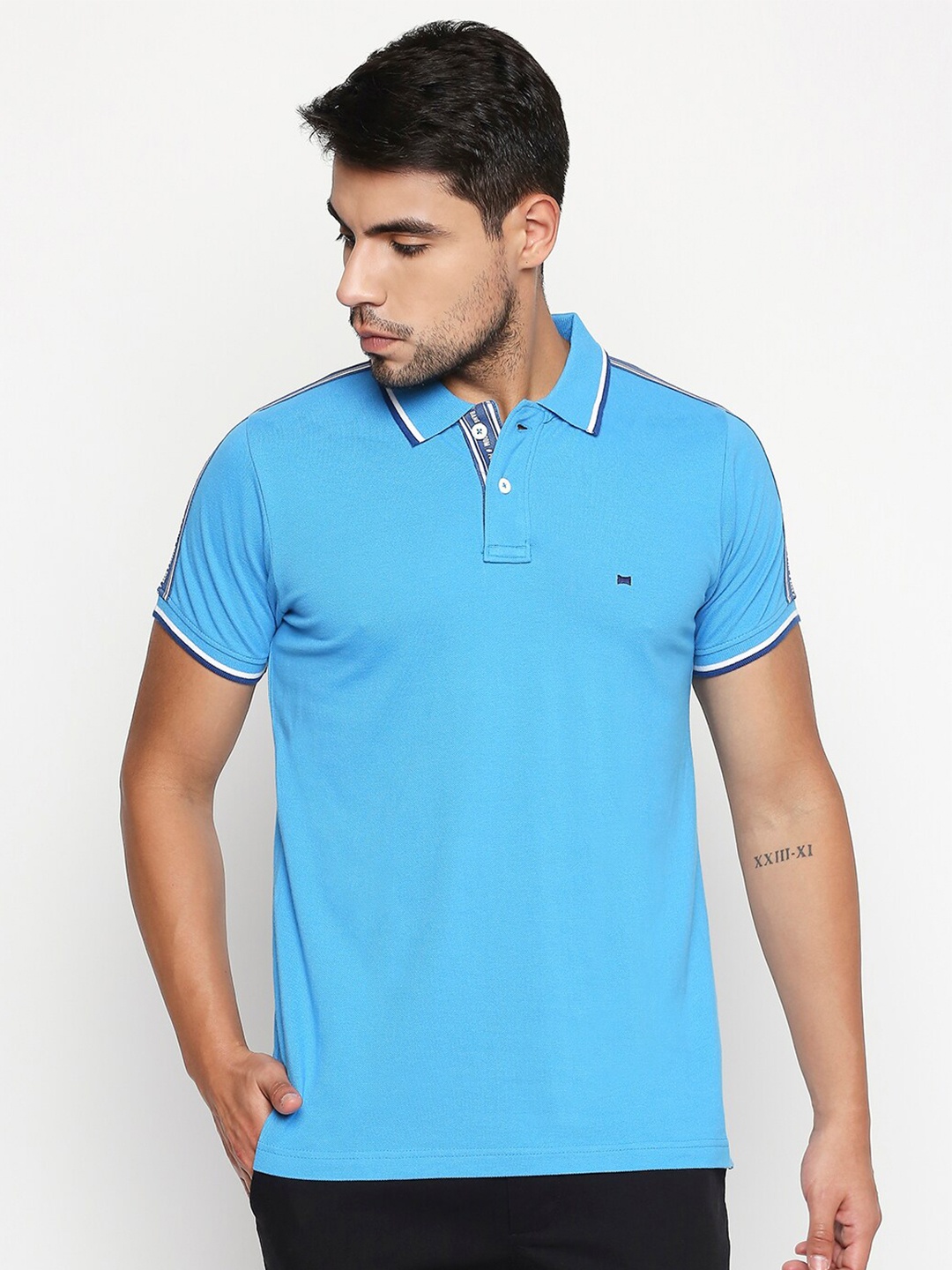 

Basics Men Blue Solid Polo Collar Slim Fit T-shirt