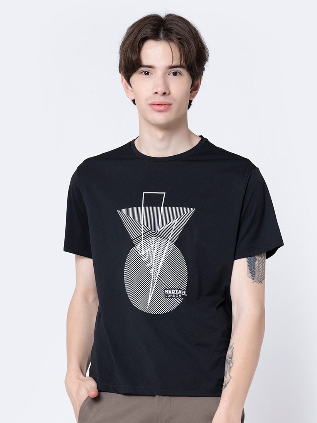 

Red Tape Men Black Graphic Print Activewear T-Shirt