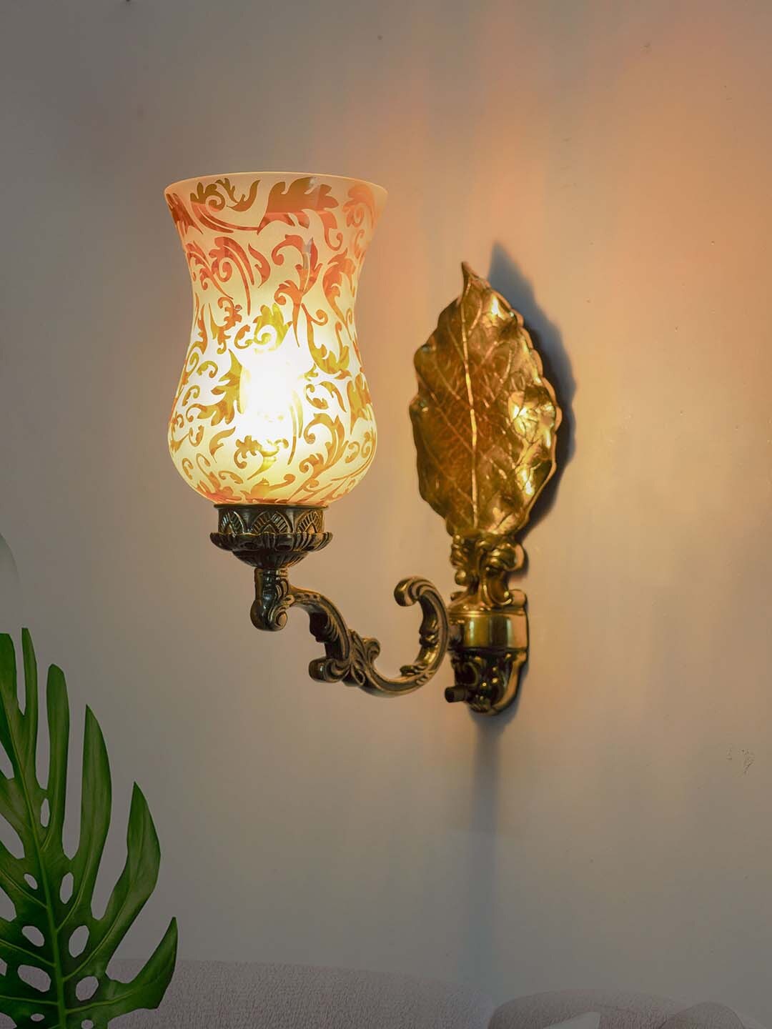 

Fos Lighting Gold-Toned Stunning Betel Leaf Aluminium Wall Sconce with Golden Etched Glass