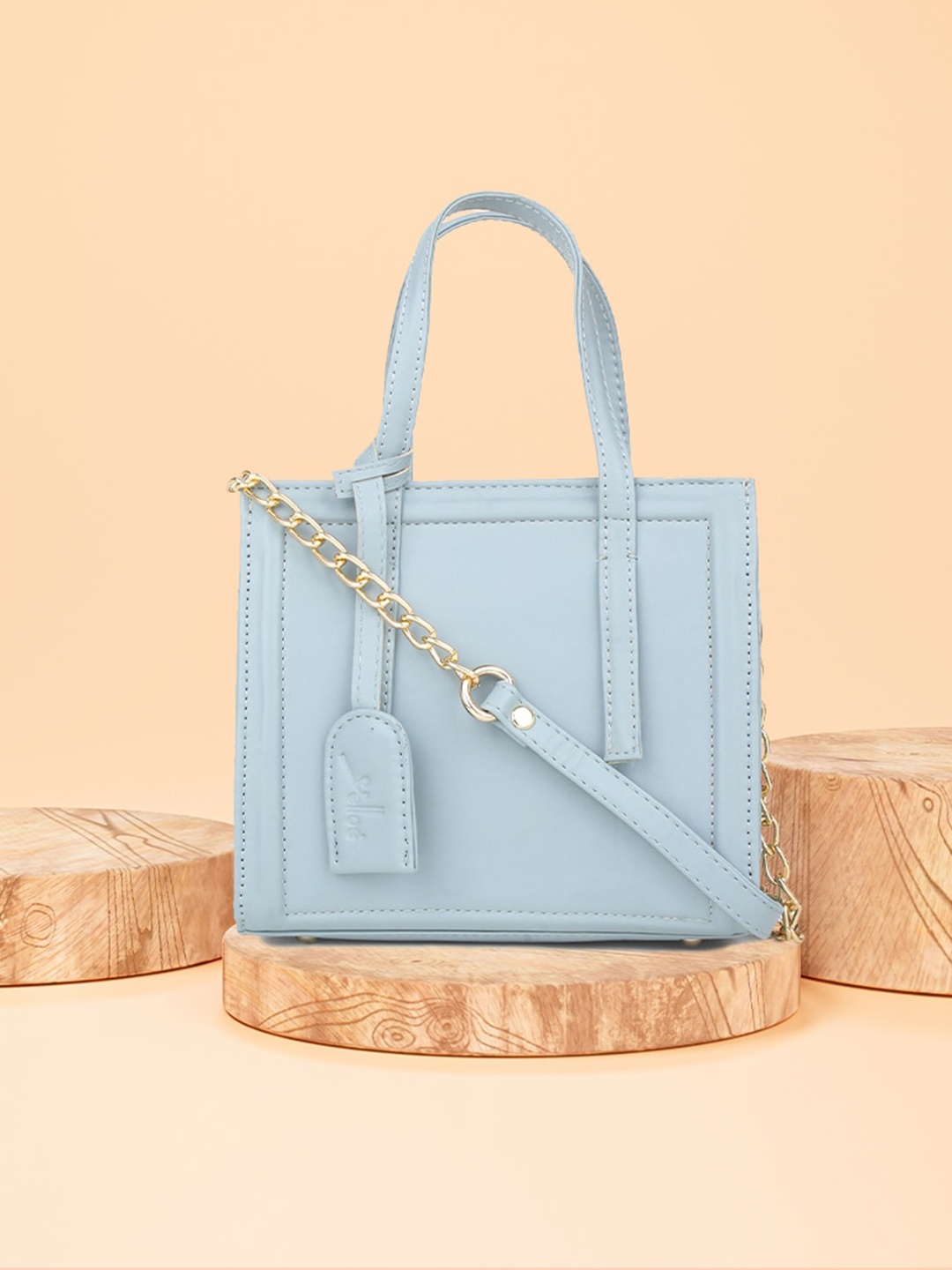 

yelloe Women Blue Structured Handheld Bag with Tasselled