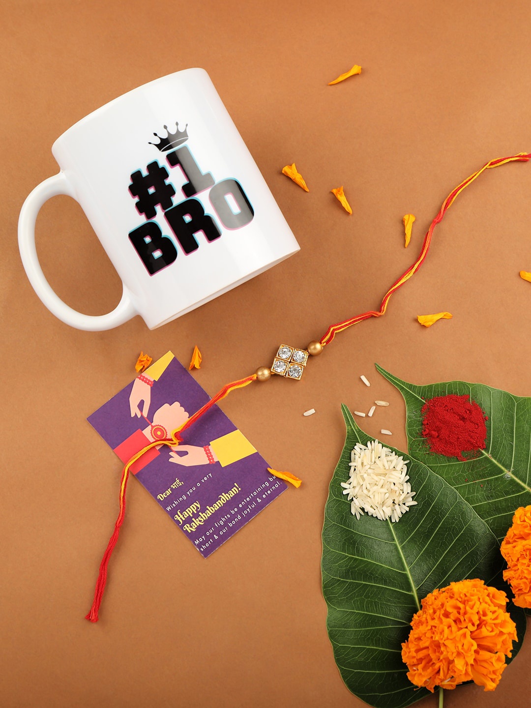 

AccessHer Rhinestones Studded Rakhi with Mug & Greeting Card, Gold