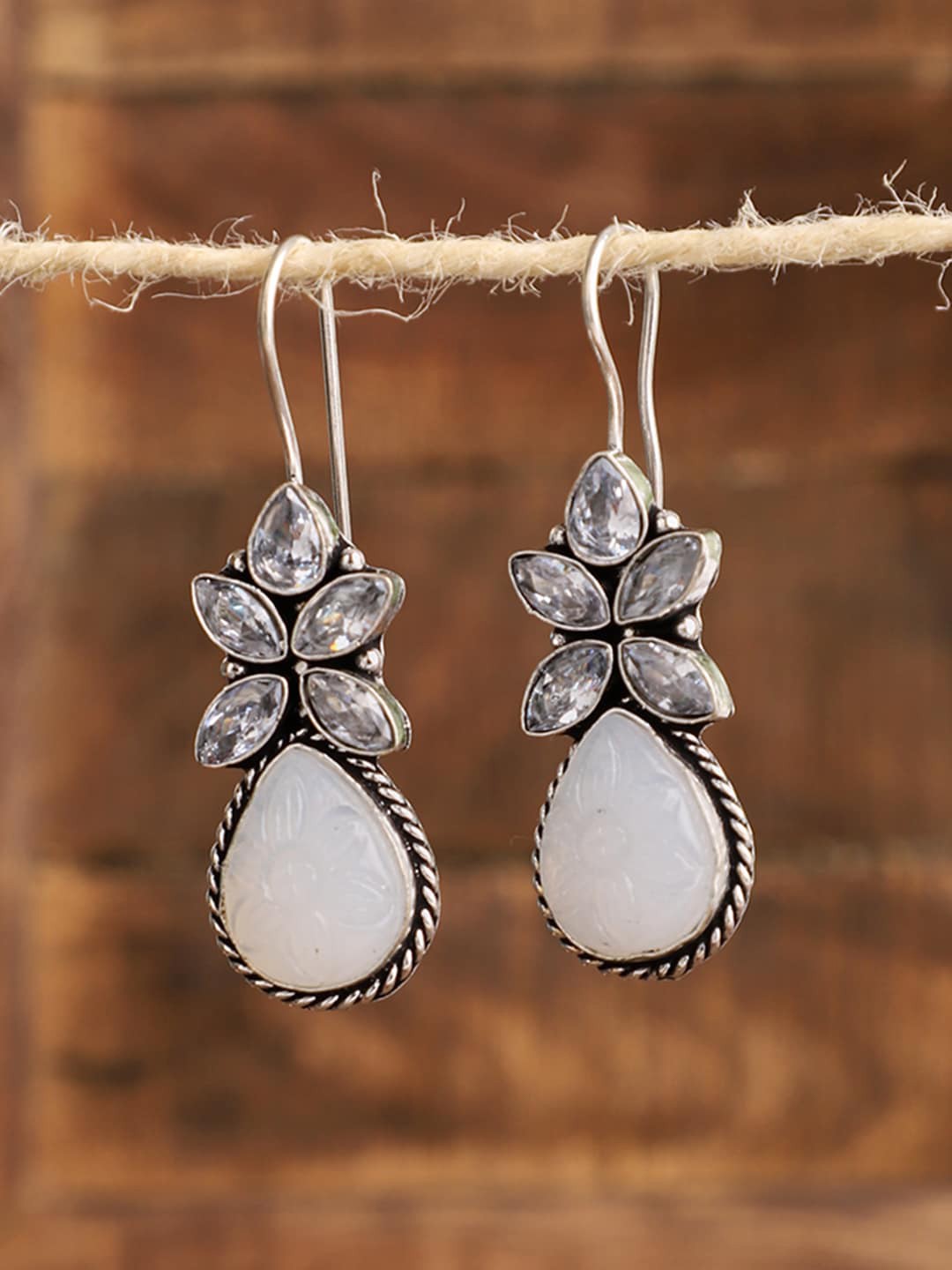 

VENI Women Silver-Toned White Stone Oval Drop Earrings