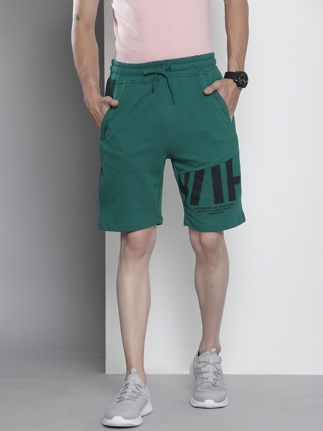 

The Indian Garage Co Men Green Typography Printed Shorts