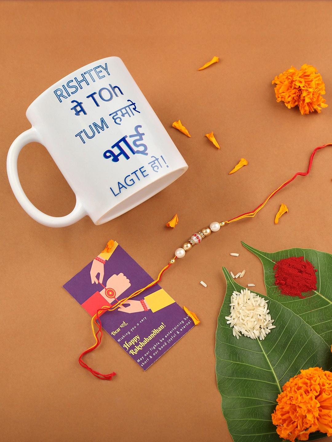 

AccessHer White & Gold-Toned Set Of 3 Stone Studded Rakhi with Mug & Greeting Card