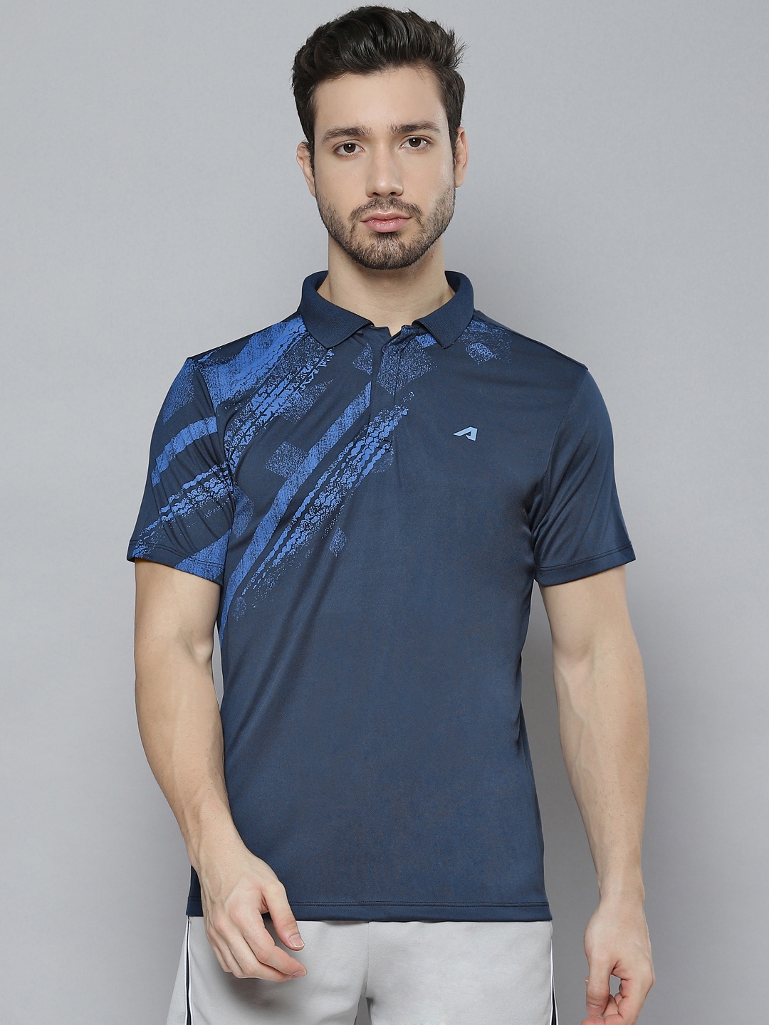 

Alcis Men Navy Blue Abstract Printed Polo Collar T-shirt