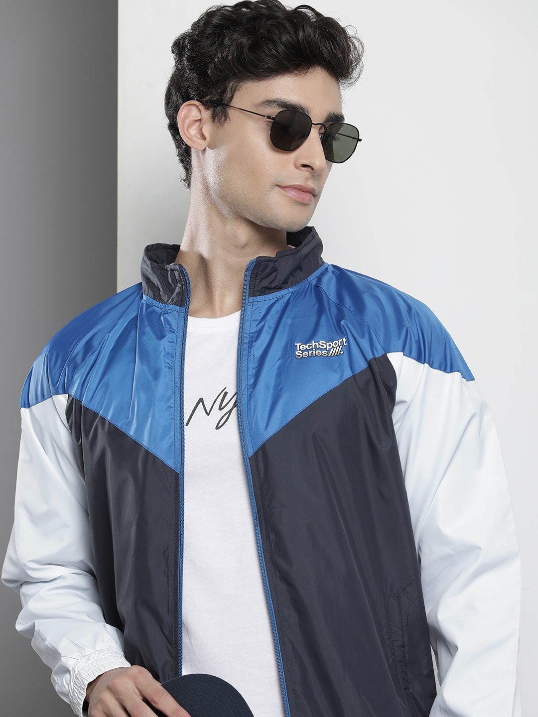 

The Indian Garage Co Men Blue & White Colourblocked Windcheater Jacket