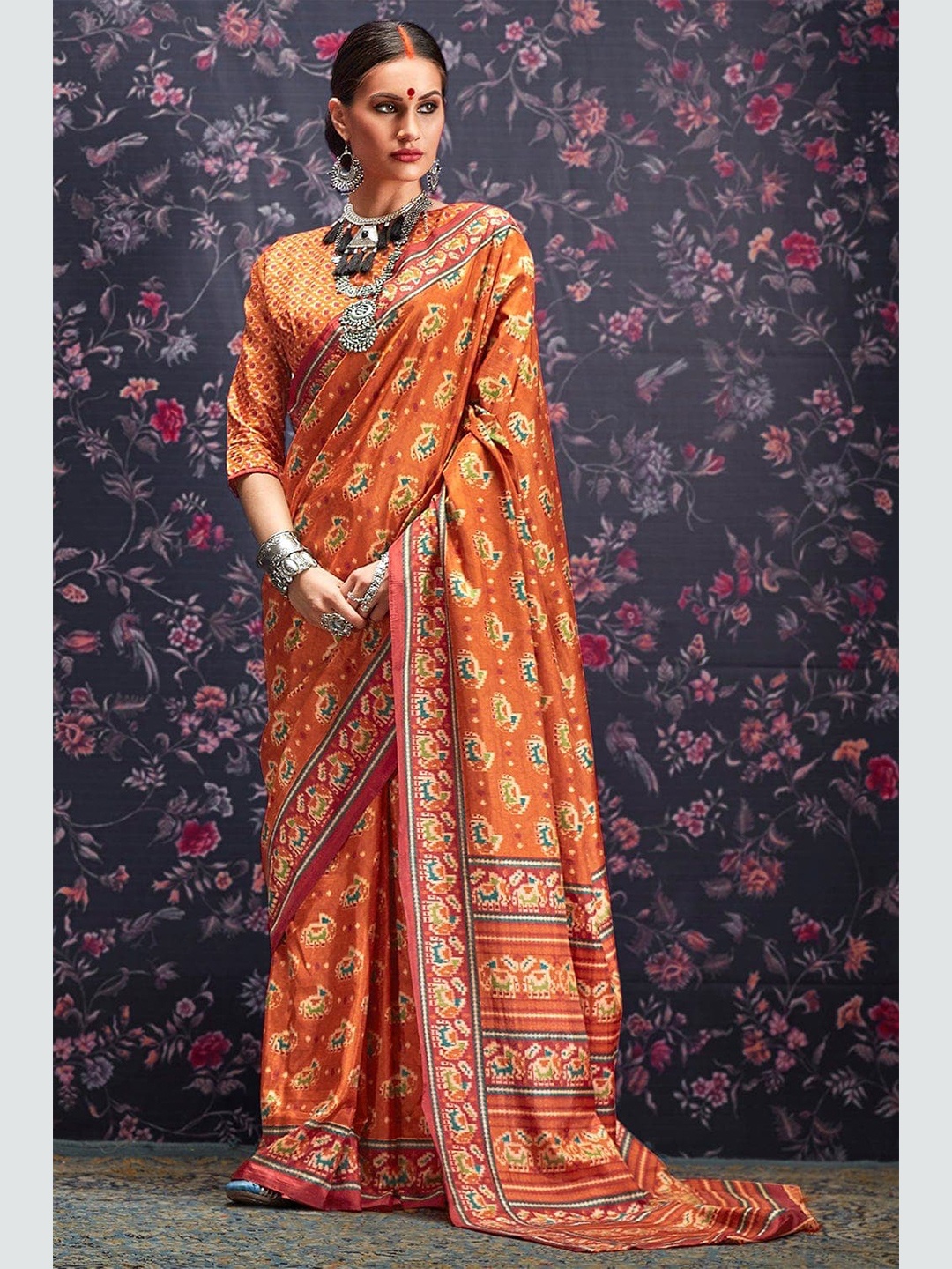 

KARAGIRI Orange Ethnic Motifs Silk Blend Patola Saree