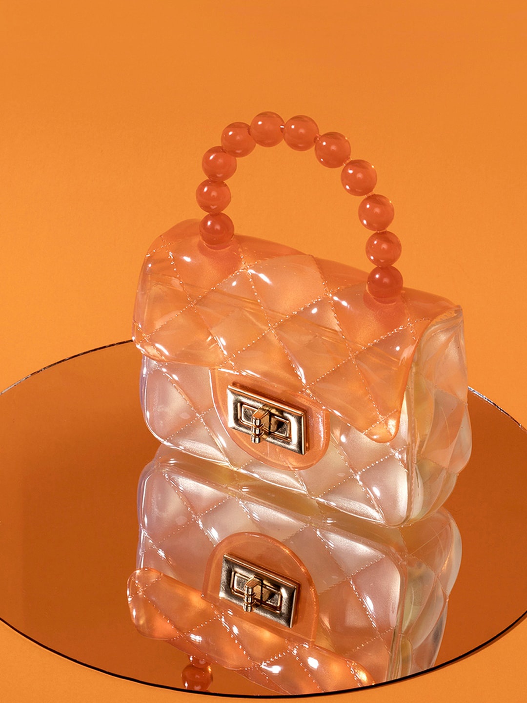 

HAUTE SAUCE by Campus Sutra Orange PU Structured Handheld Bag with Quilted