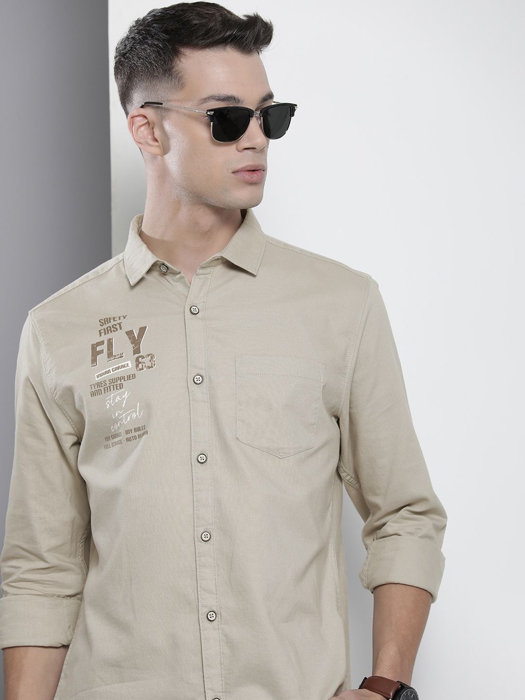 

The Indian Garage Co Men Green Printed Cotton Casual Shirt