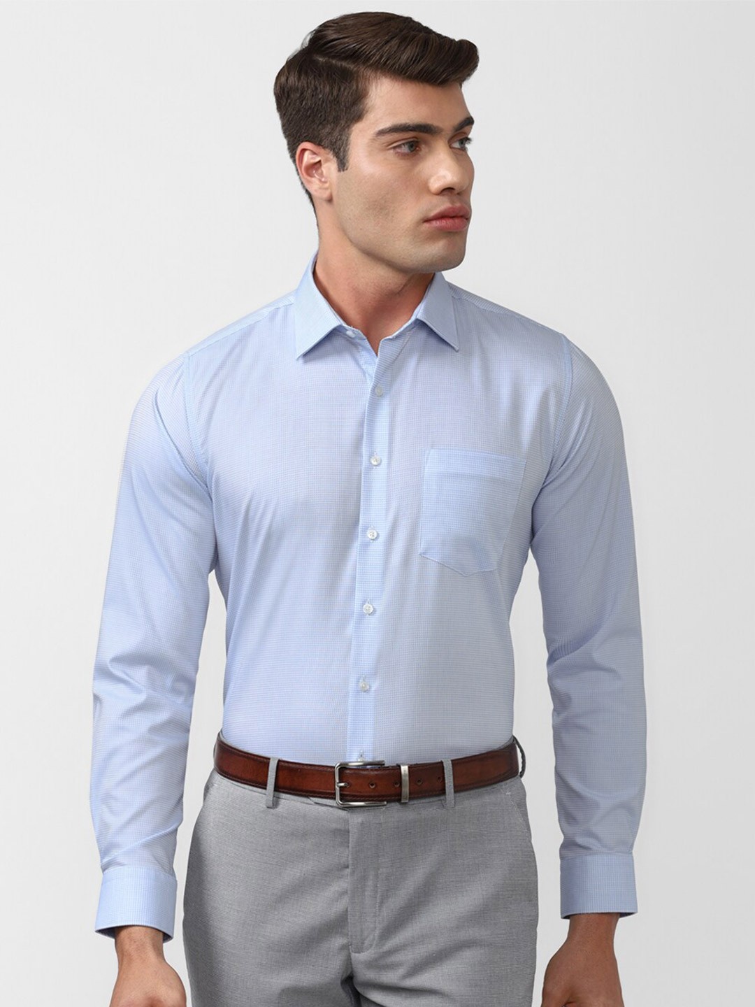 

Van Heusen Men Blue Solid Slim Fit Formal Shirt