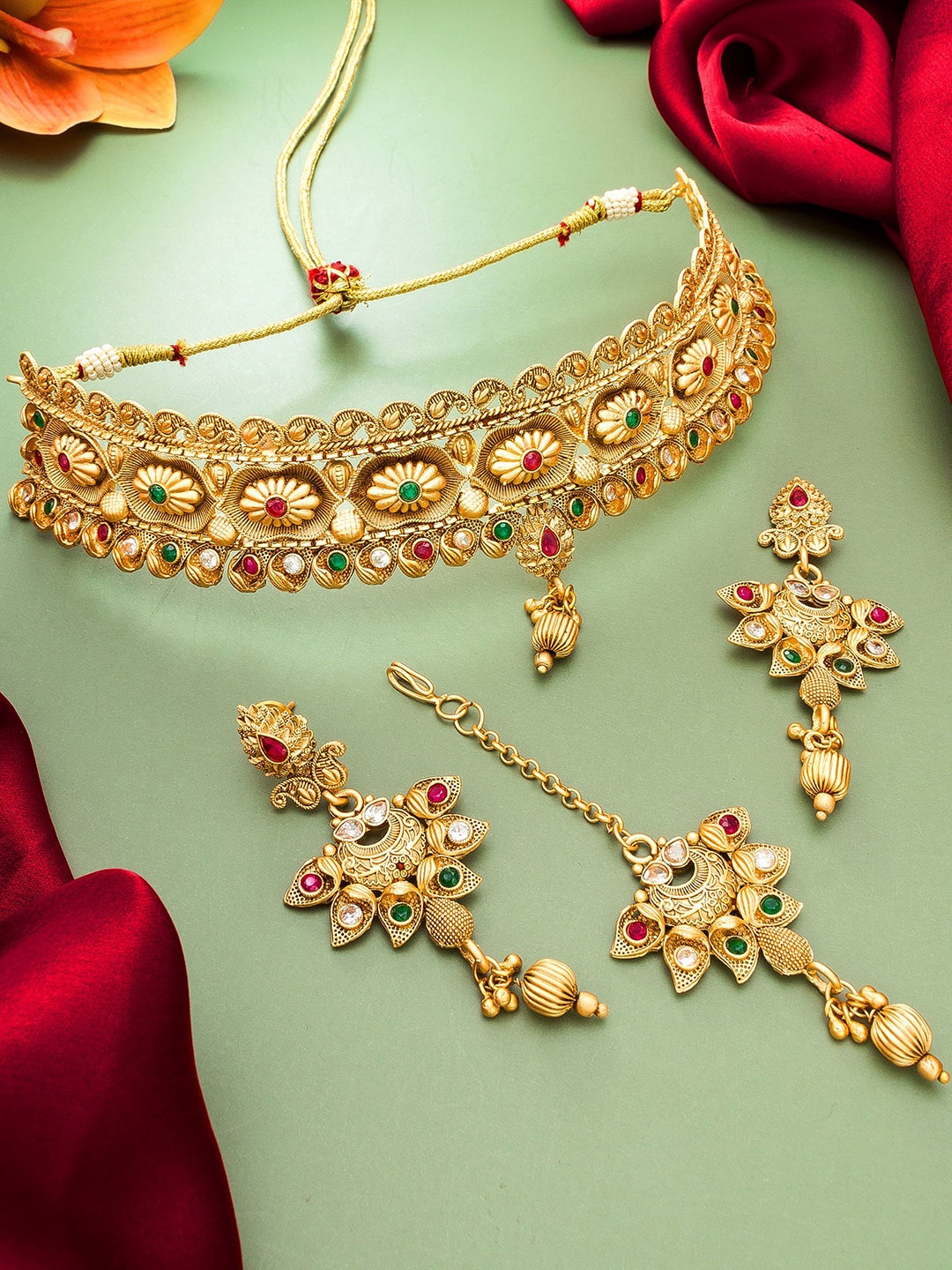 

aadita Gold-Plated Red & Green Ruby Studded Choker Jewellery Set
