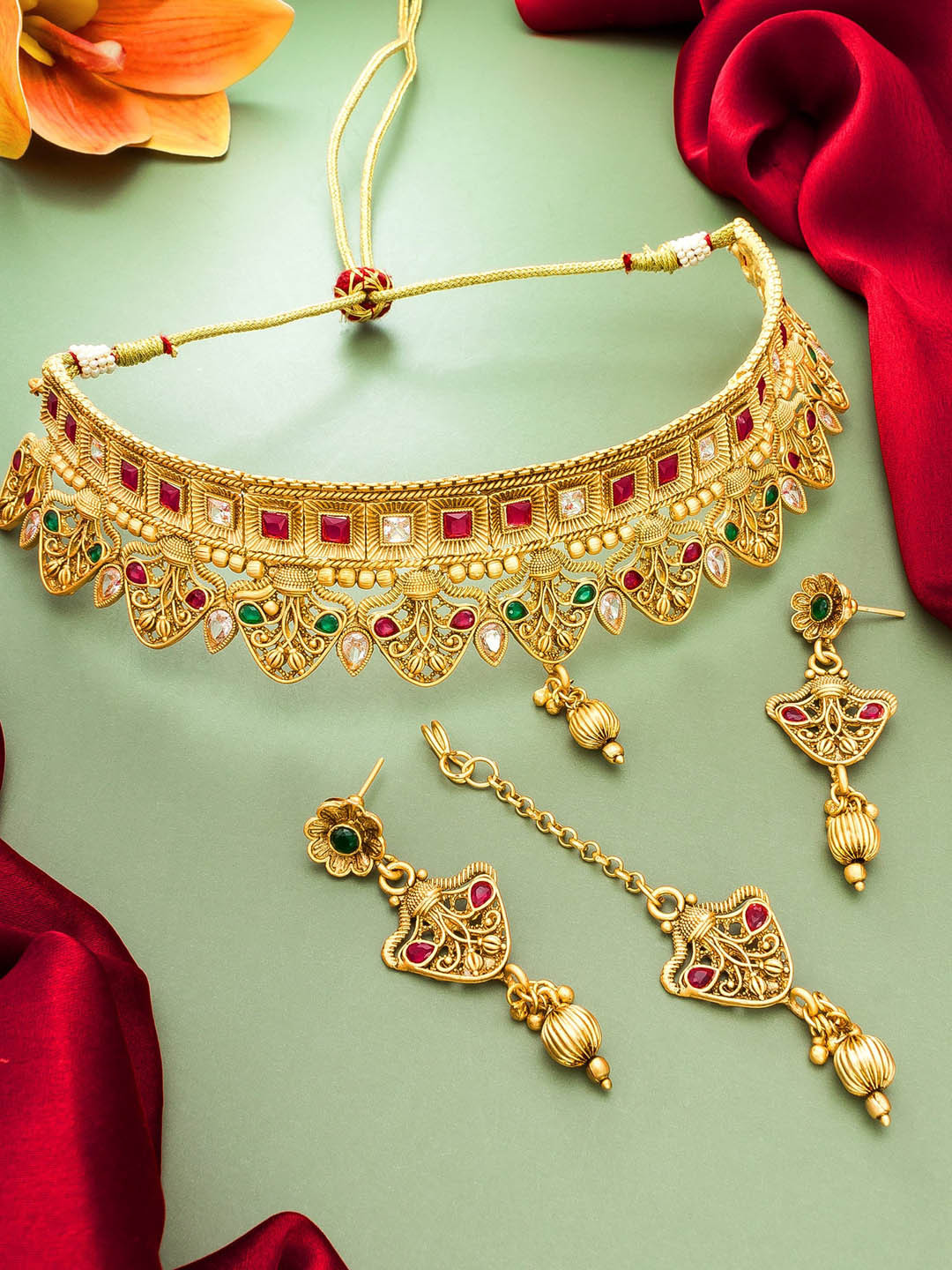 

Aadita Gold-Plated Red & Green Studded Jewellery Set