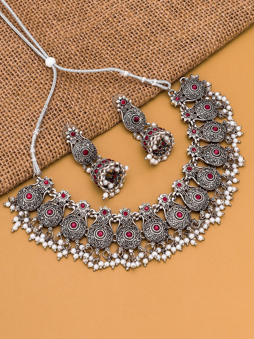 

aadita Silver-Plated Pink Stone Studded Jewellery Set