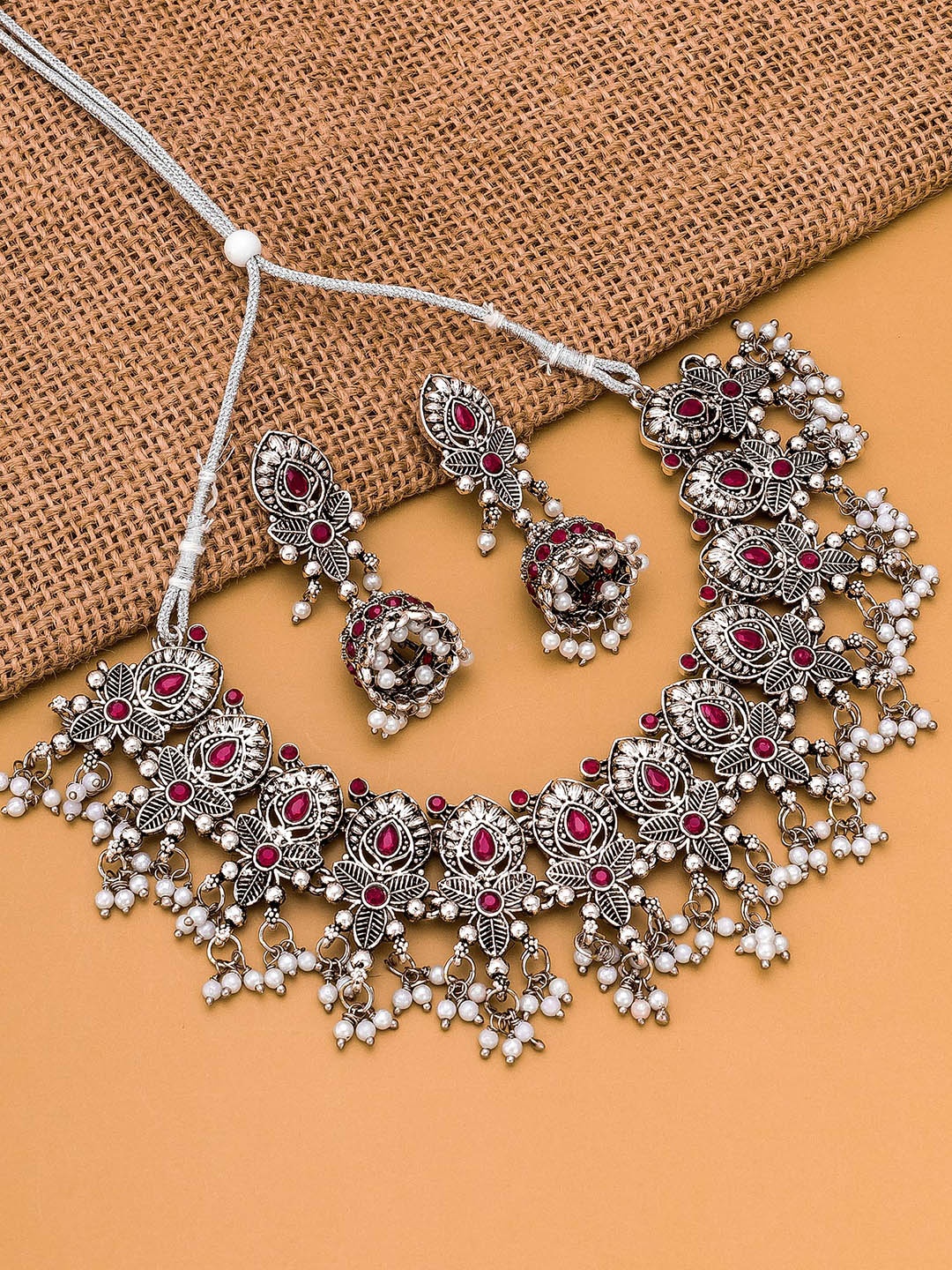 

aadita Silver-Toned & Plated Stone-Studded Temple Choker Jewellery Set