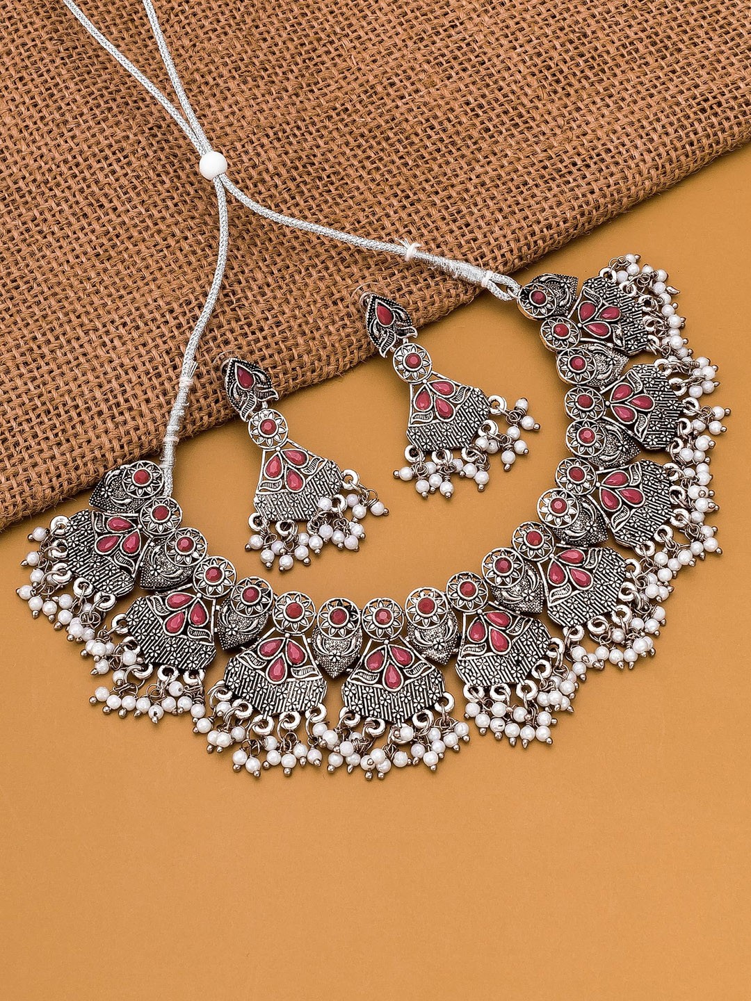 

aadita Silver-Plated Pink Stone Studded Temple Choker Set
