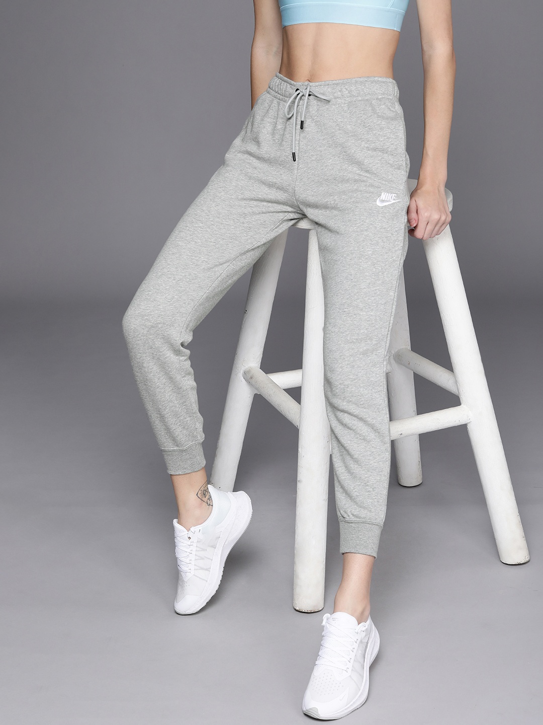 

Nike Sportwear Women Grey Melange Solid Essential Fleece Regular Fit Joggers