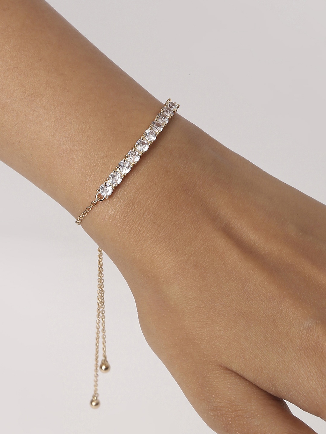 

Lilly & sparkle Women Gold-Plated & White Brass Cubic Zirconia Link Bracelet