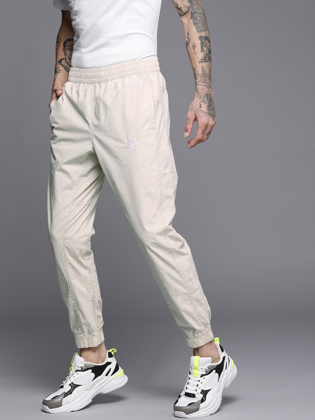

Nike Men Of-White Brand Logo Embroidered Club WVN Joggers, Off white