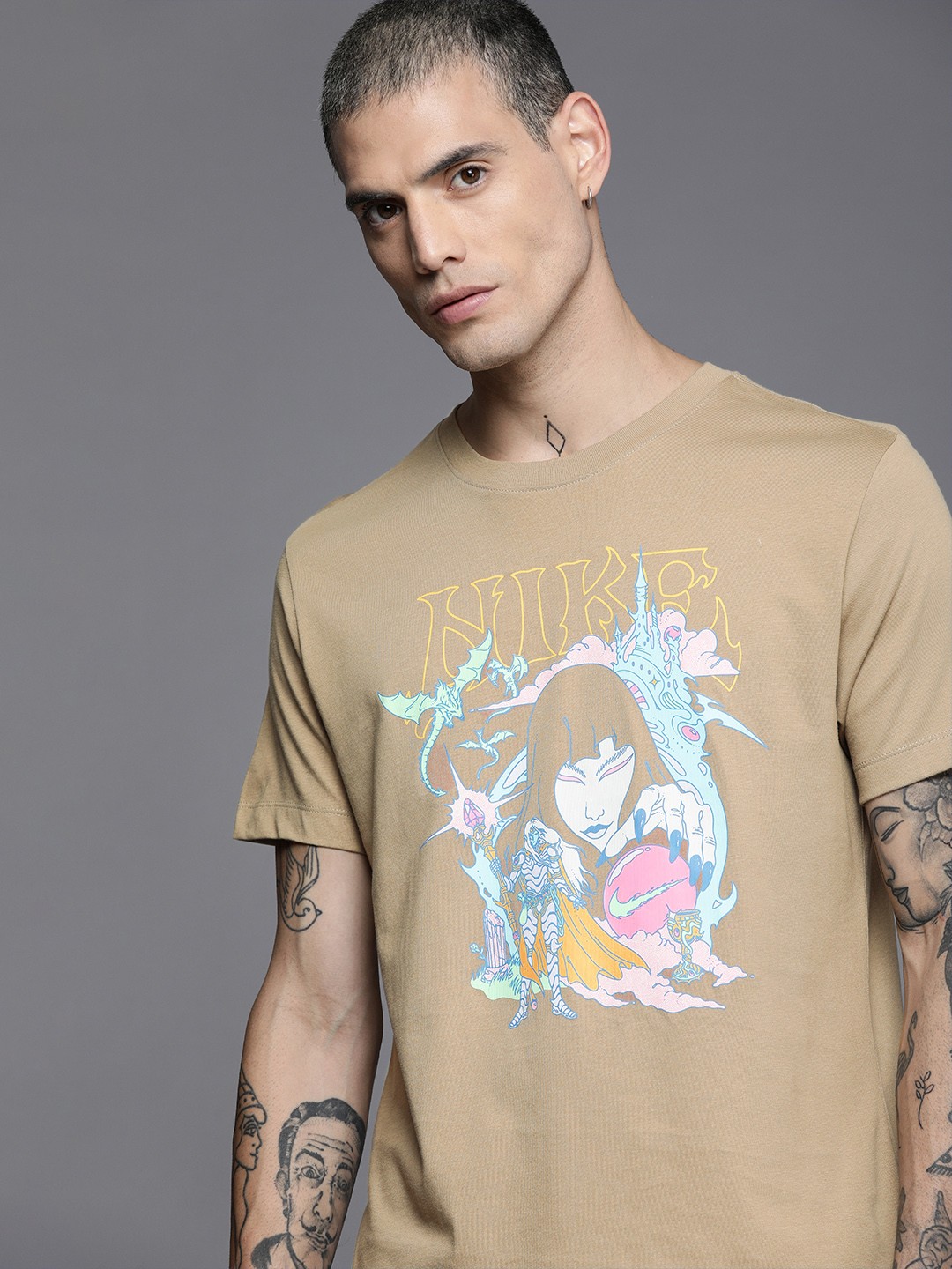 

Nike Men Beige & Blue Graphic Printed Pure Cotton Casual T-shirt