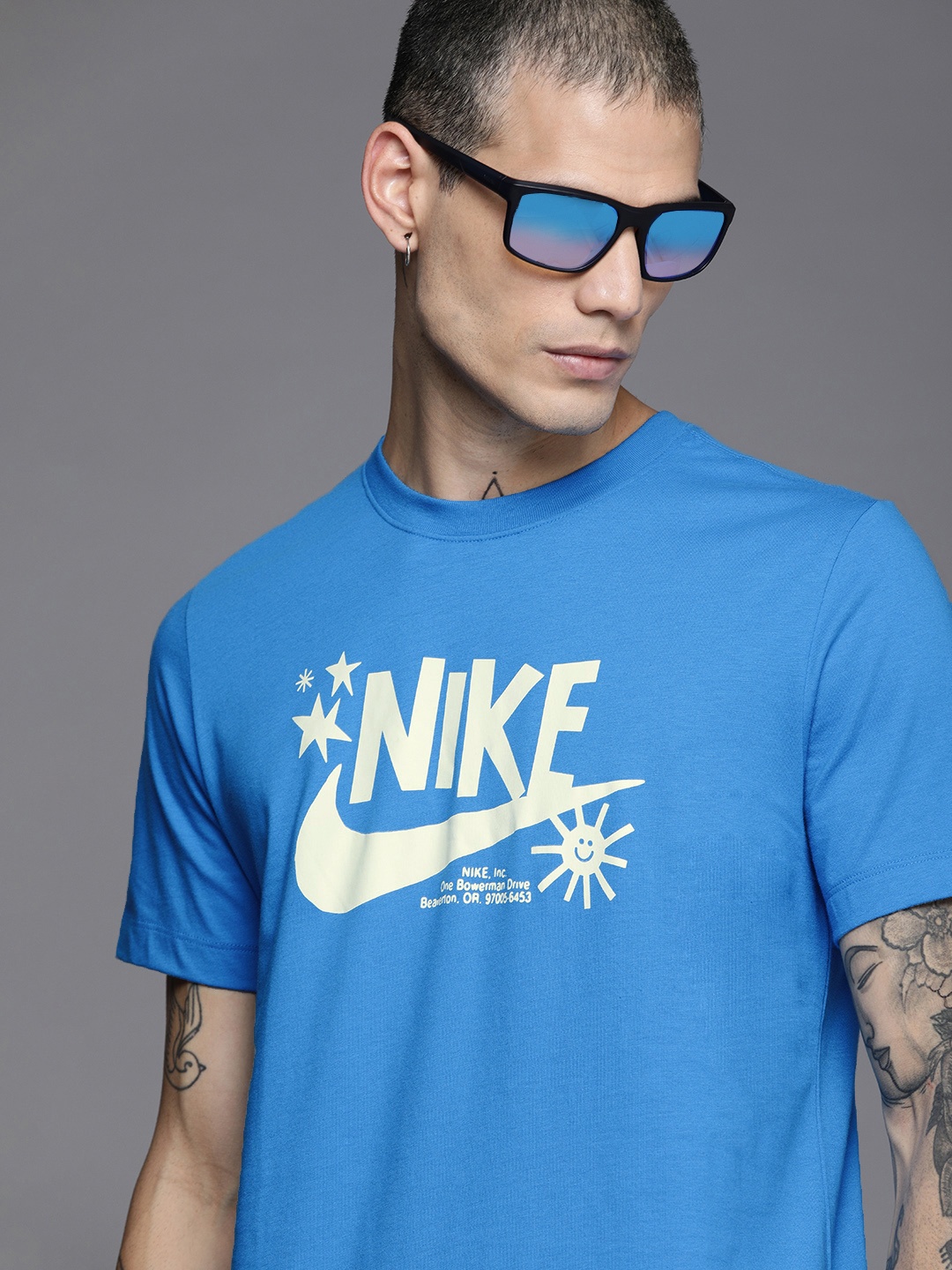

Nike Men Blue & White Brand Logo Printed T-shirt