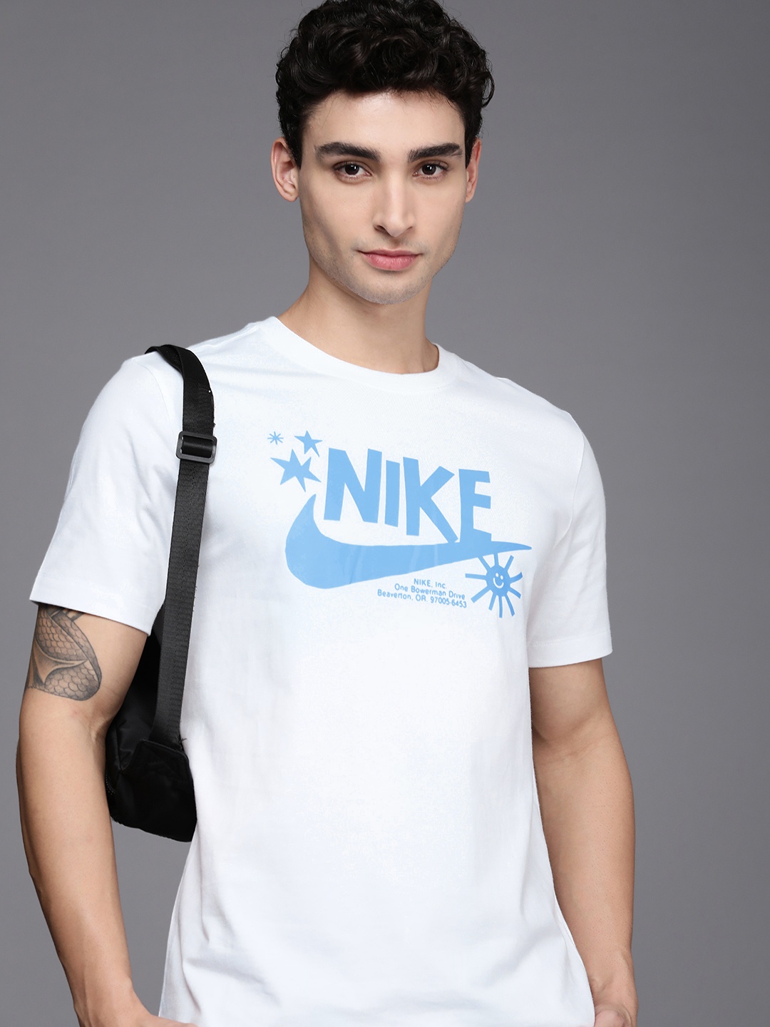 

Nike Men White & Blue Brand Logo Printed Pure Cotton STATEMENT T-shirt