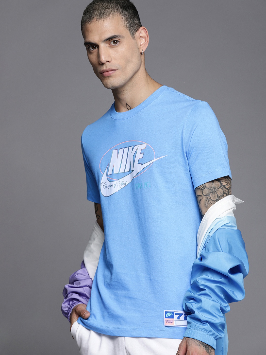 

Nike Men Blue & White Brand Logo Striped T-shirt