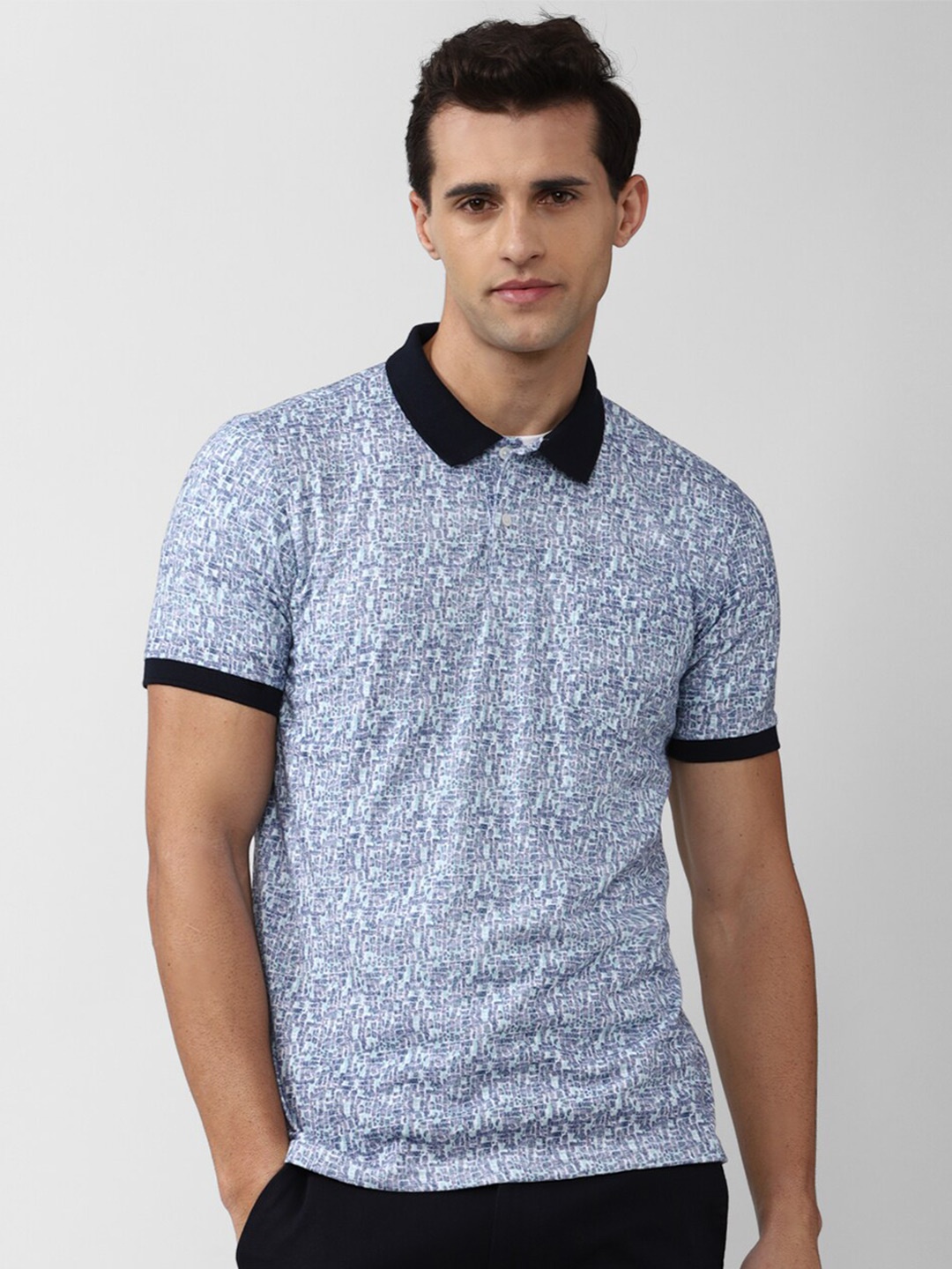 

Peter England Casuals Men Blue & Black Printed Polo Collar T-shirt Plus Size