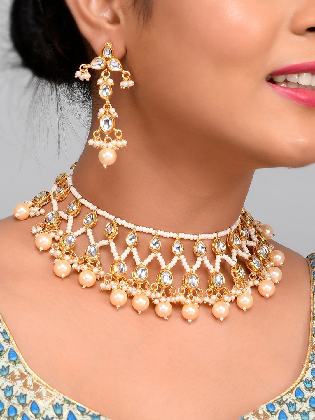 

AQUASTREET JEWELS Gold-Plated White Kundan & Pearl Studded Jewellery Set