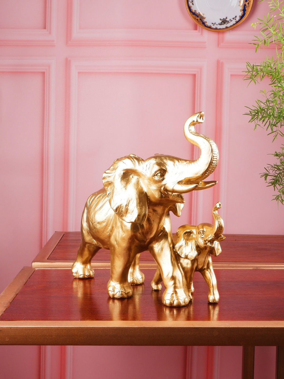 

THE WHITE INK DECOR Gold-Toned Polyresin Elephant Showpieces