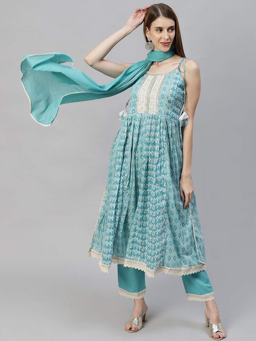 

FASHOR Women Blue Floral Printed Pleated Sequinned Kurti with Trousers & With Dupatta