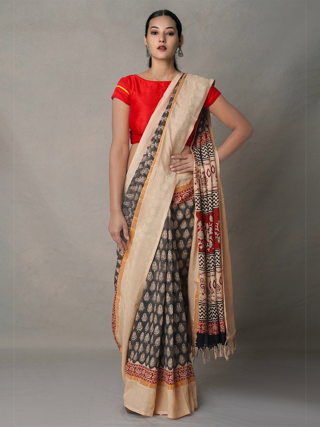 

Unnati Silks Black & Beige Ethnic Motifs Zari Silk Blend Bagru Saree