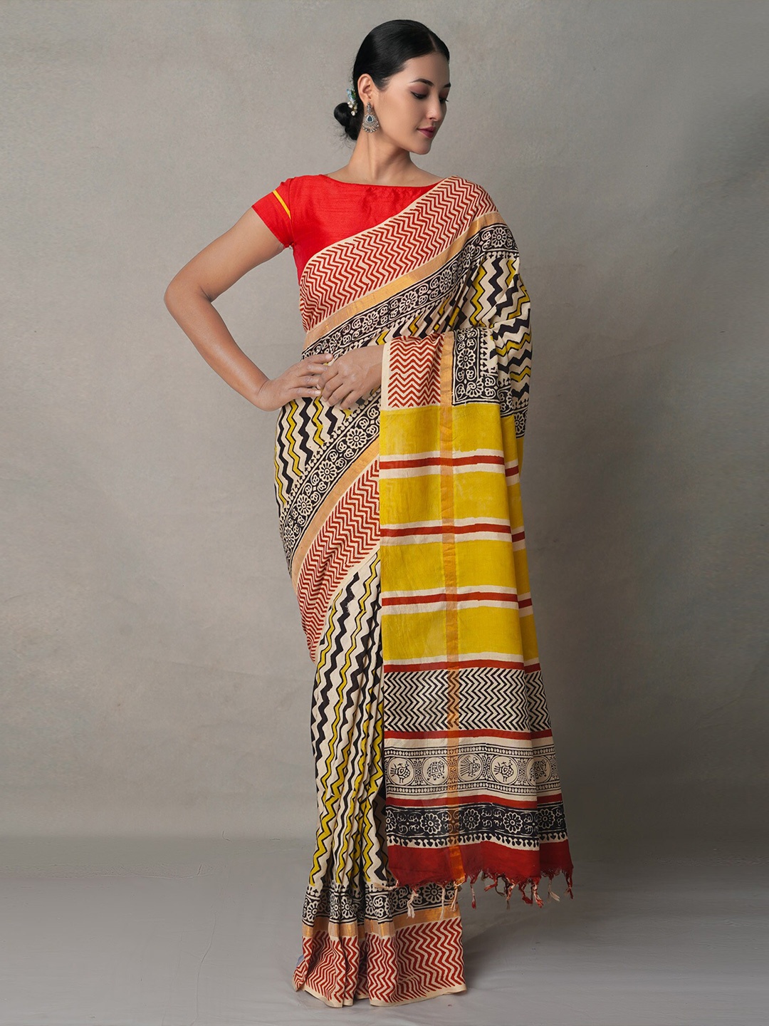 

Unnati Silks Yellow & Maroon Leheriya Silk Blend Bagru Saree