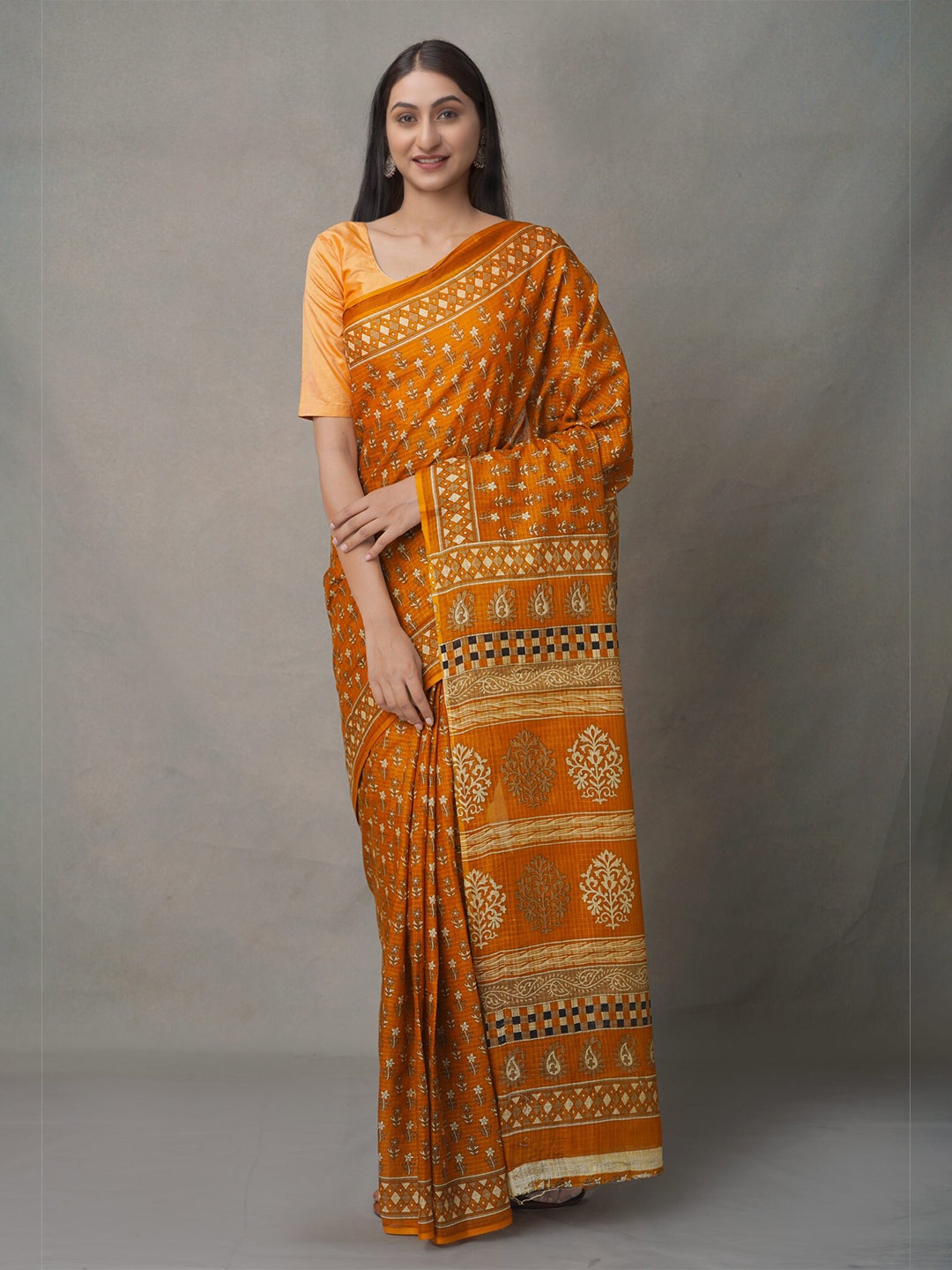 

Unnati Silks Orange & Green Ethnic Motifs Pure Cotton Block Print Saree