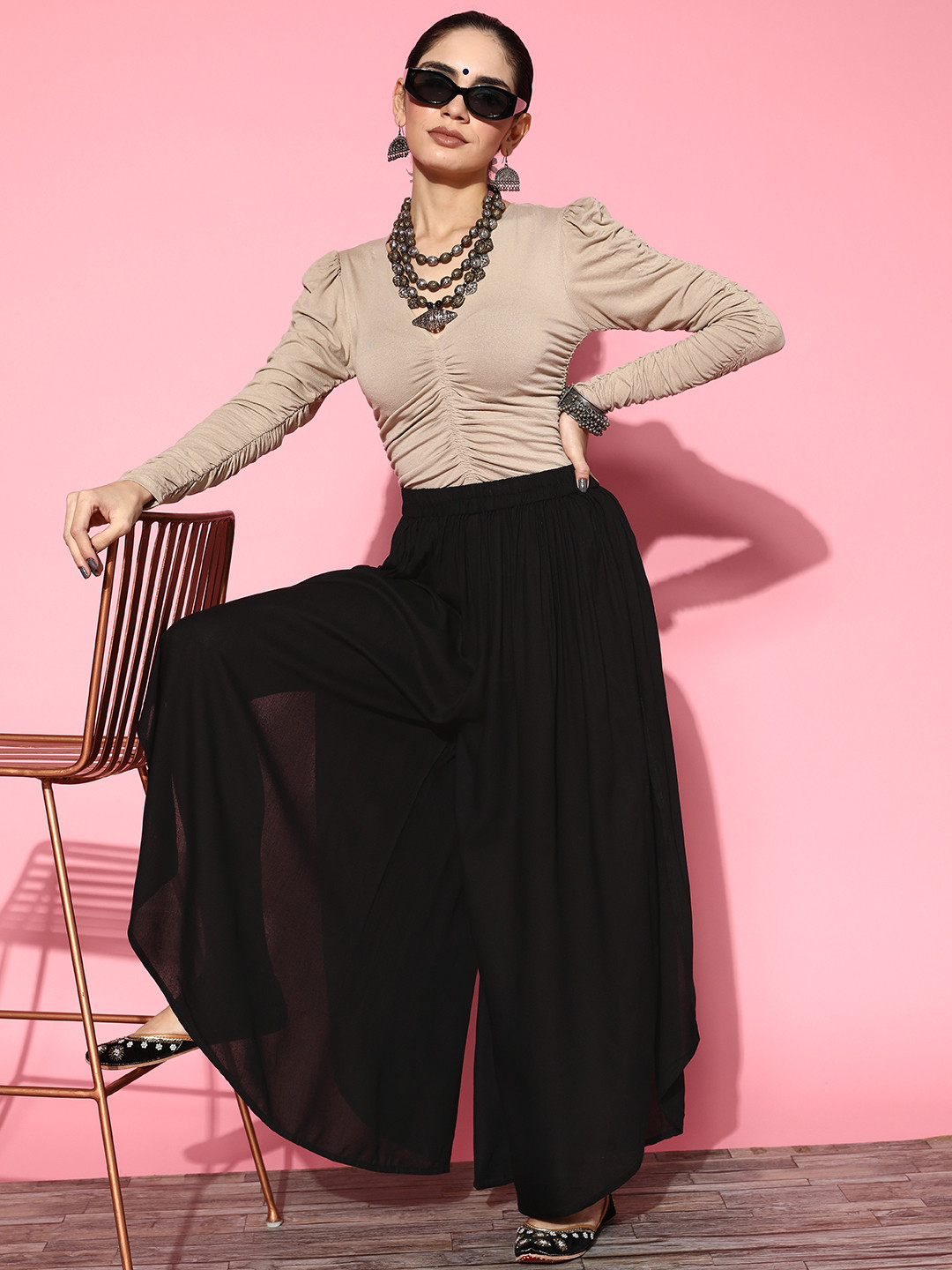 

InWeave Women Black Solid Side Slit Semi-Sheer Flared Palazzos