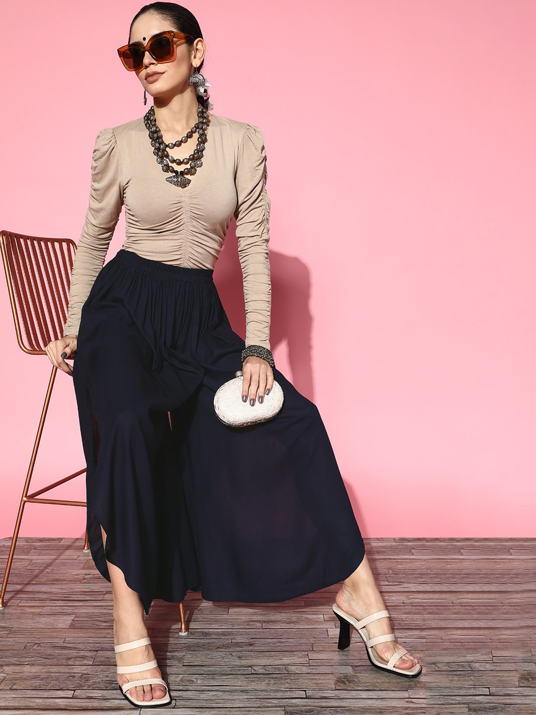 

InWeave Women Navy Blue Solid Side Slit Flared Palazzos