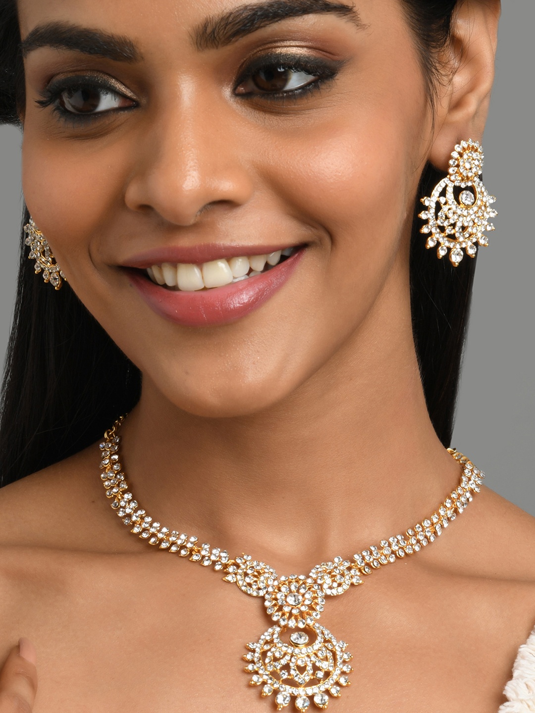 

Fida Gold-Plated & White American Diamond Studded Jewellery Set